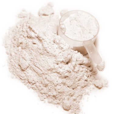 A plastic scoop filled with and next to a mound of white Maxi-HGH™ powder